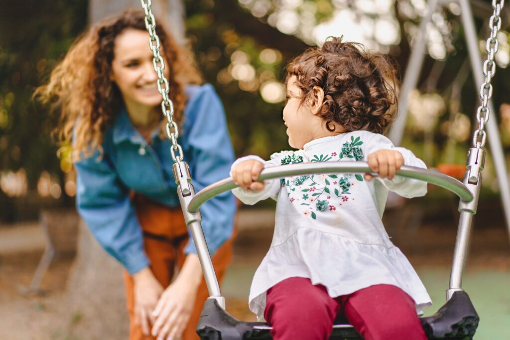 Mother and Child swinging