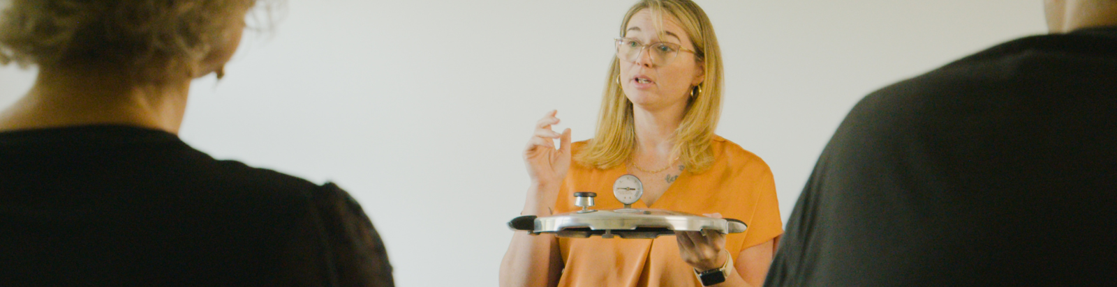 Dr. Kristen Riggsbee teaching about canning to a class